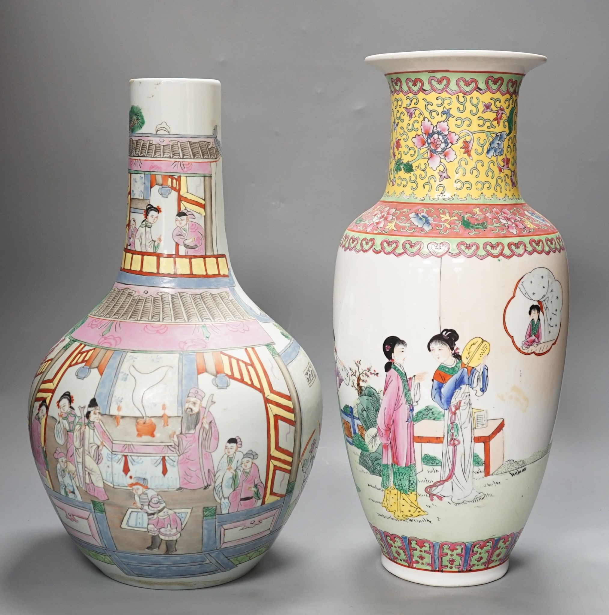 Two Chinese famille rose vases, tallest 42 cms high.